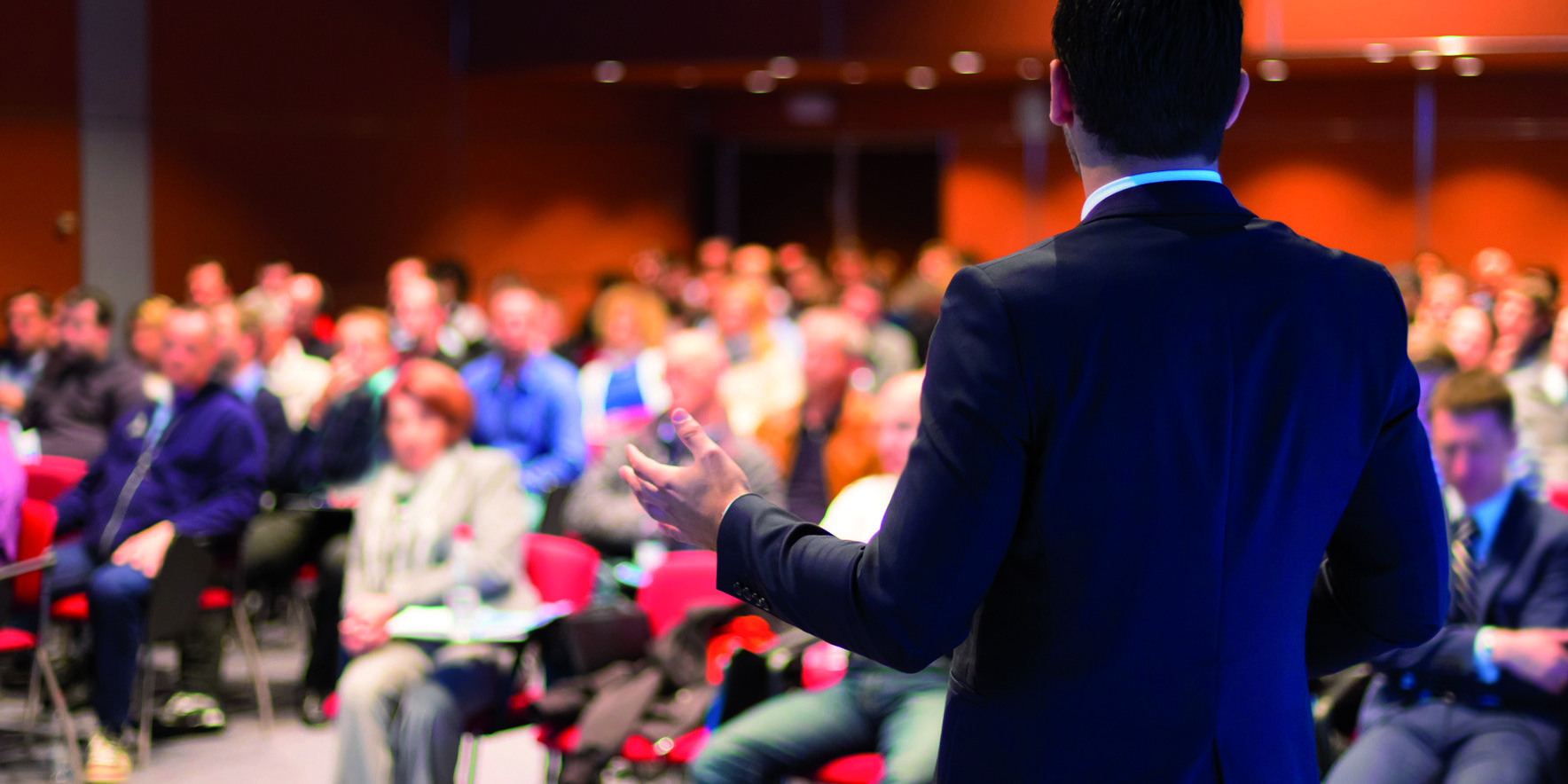 Speaker at Business Conference and Presentation.